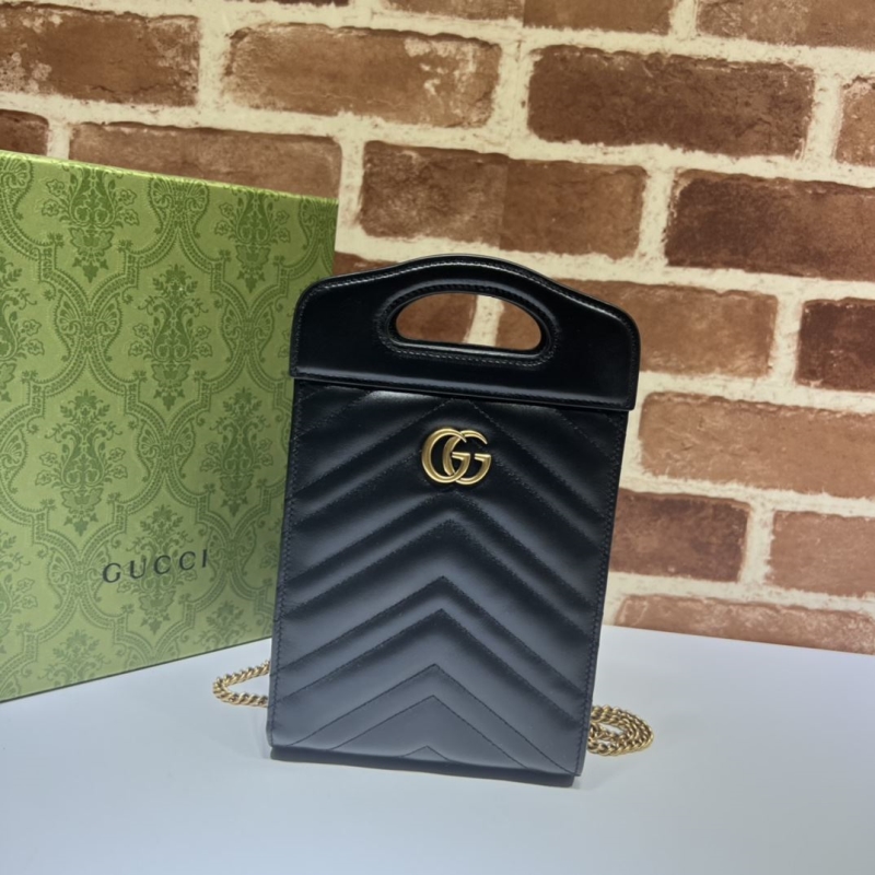 G*u*i top handle bags